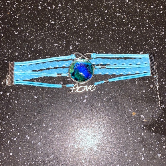 Blue Faux Leather Bracelet with Hand Painted Alcohol Ink Art Under Domed Glass - Picture 2 of 2